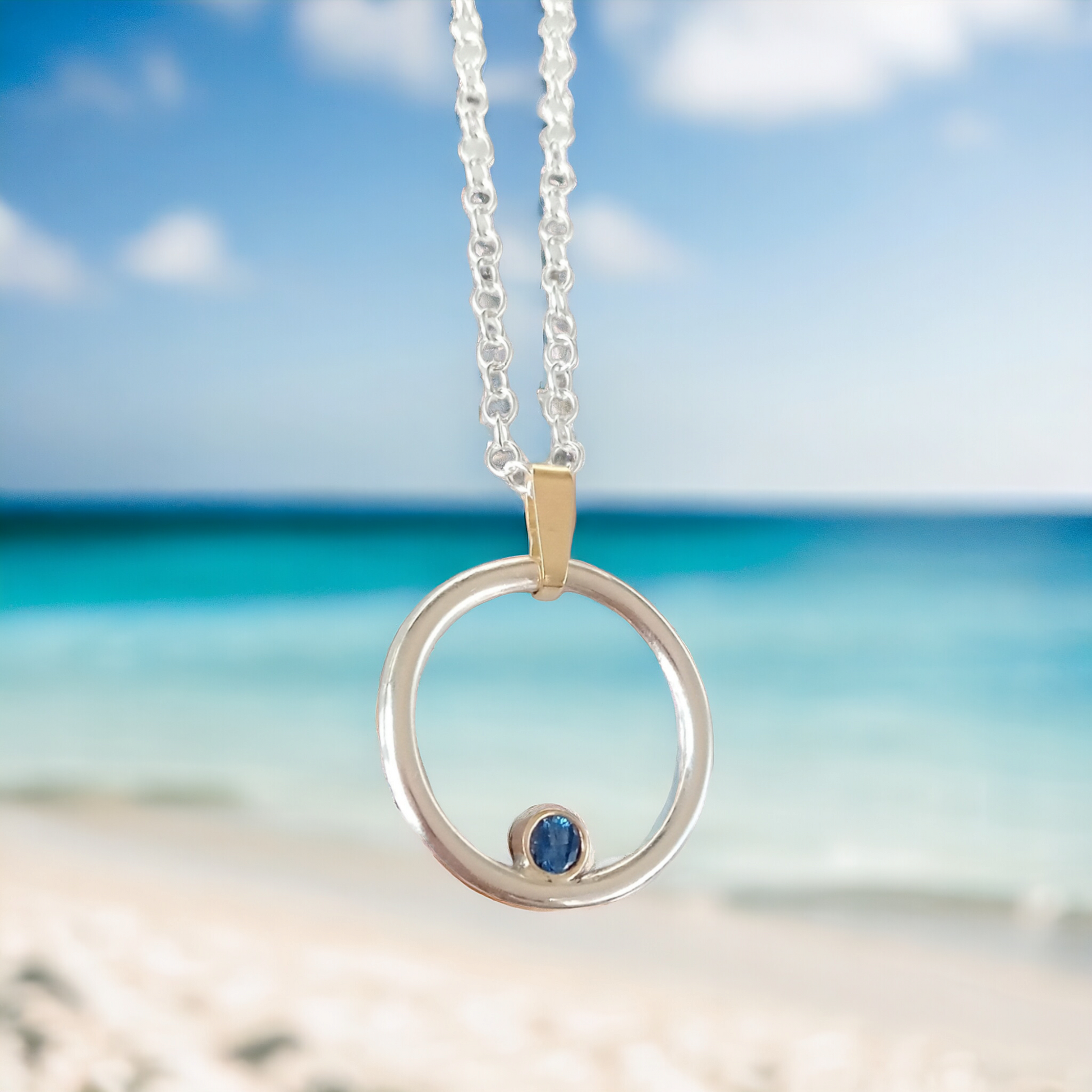 Silver and Gold Circle Sapphire Pendant