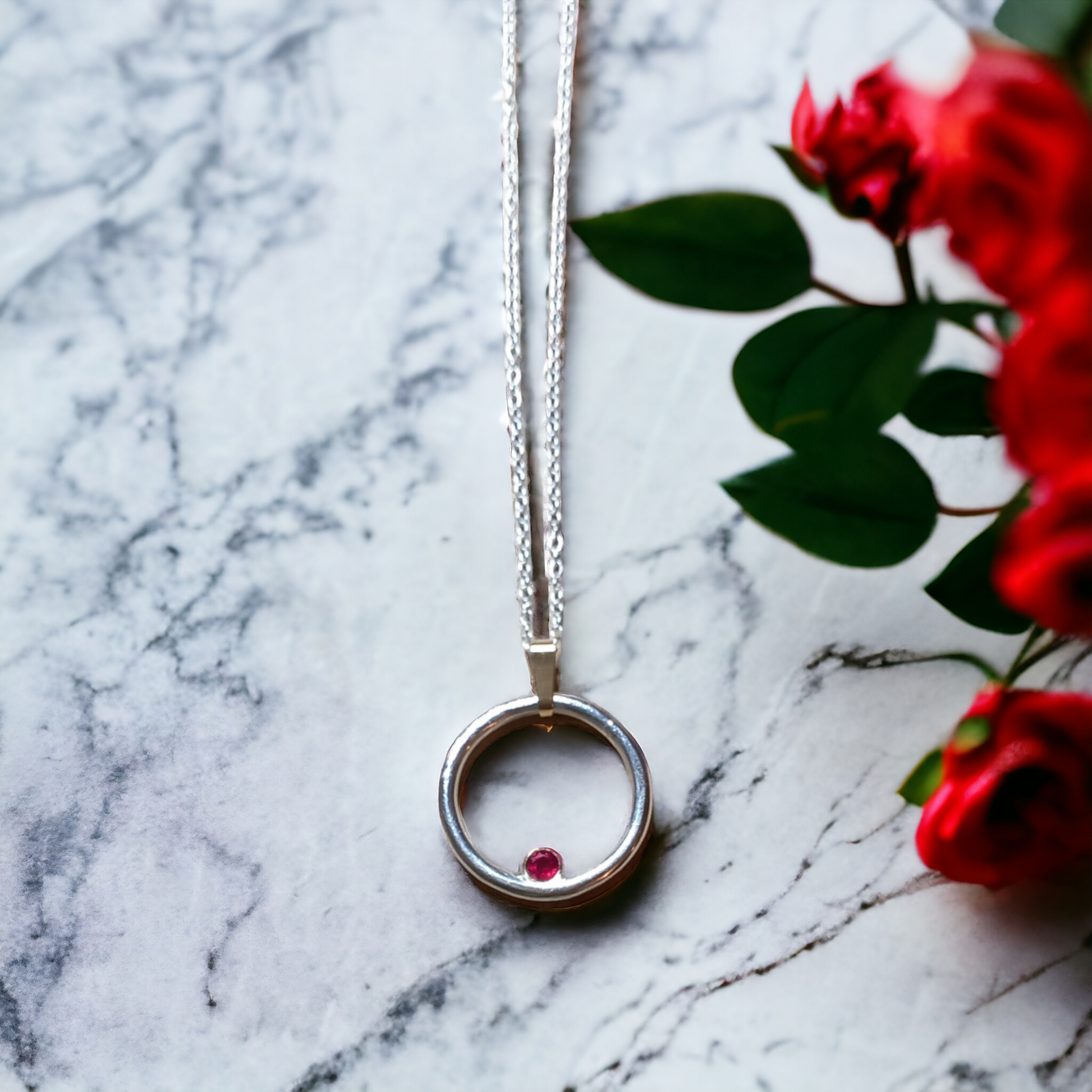 Silver and 9ct Gold Ruby Circle Pendant