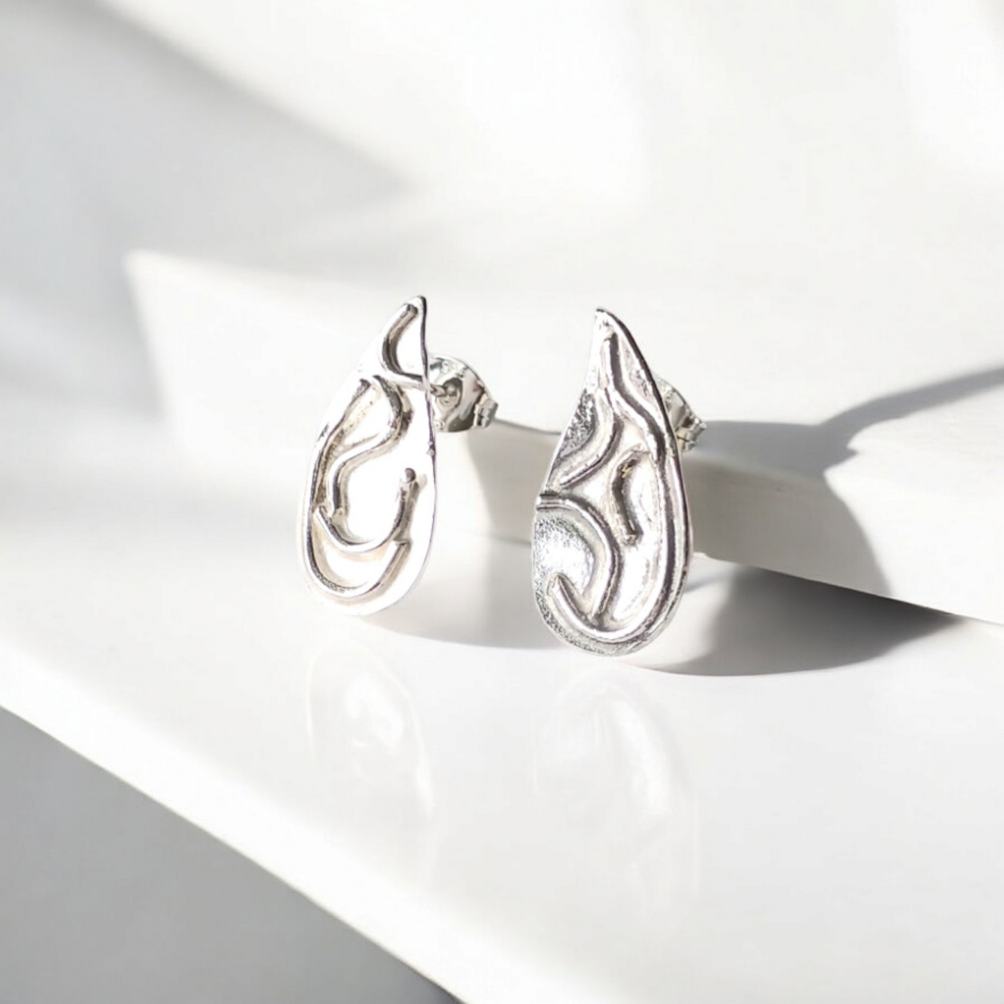 Handmade Teardrop Wave Solid Silver Earrings with post and butterfly backs.