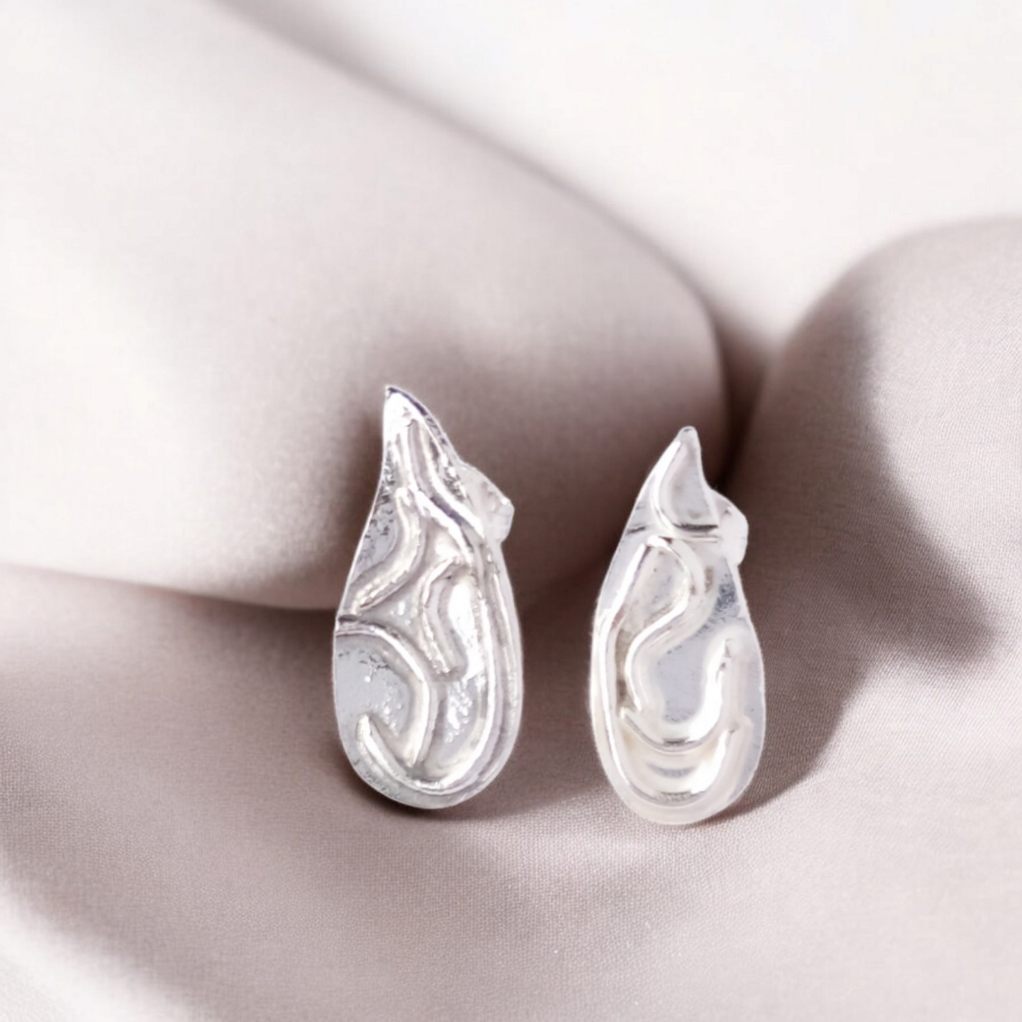 Handmade Teardrop Wave Solid Silver Earrings with post and butterfly backs.