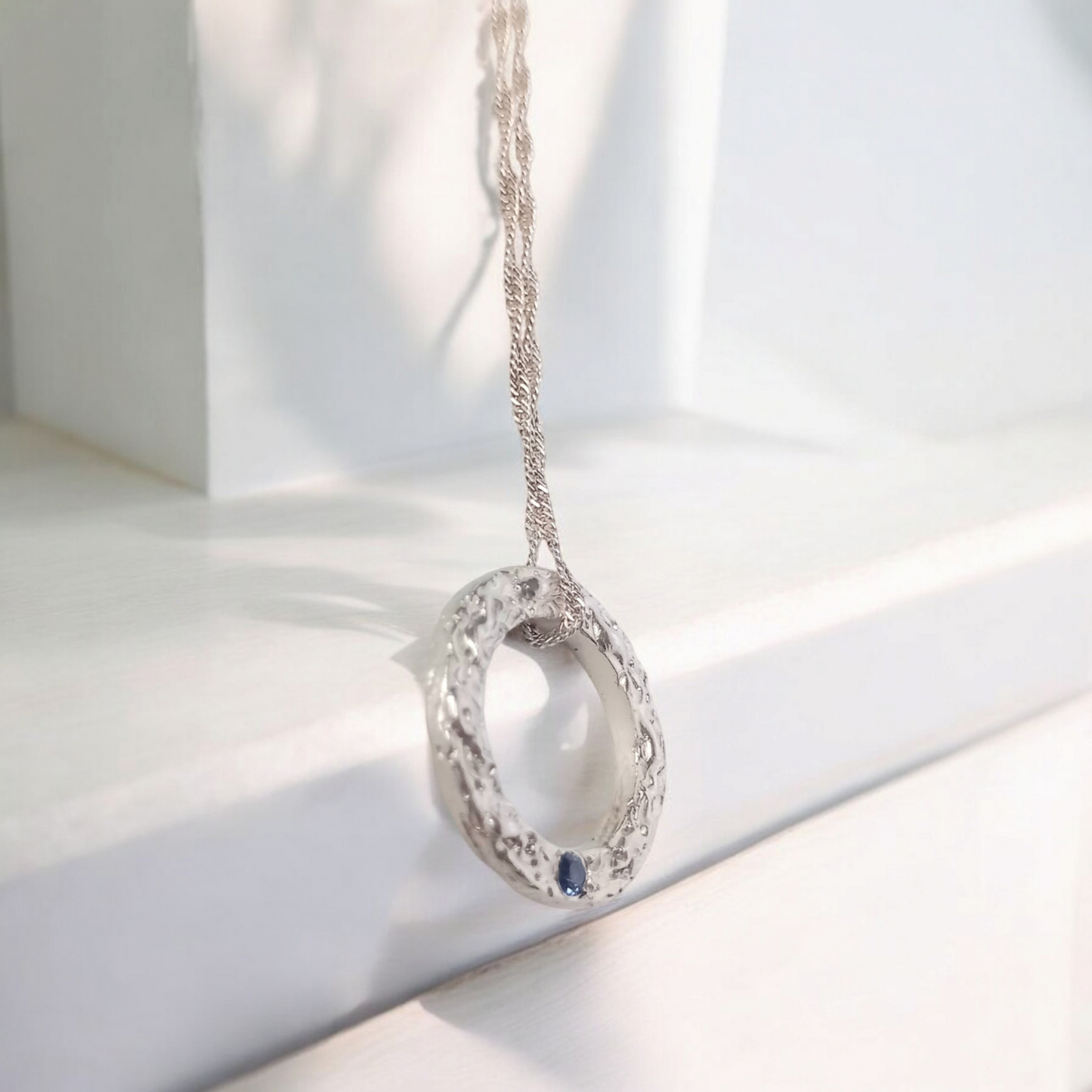Handmade Solid Silver Sapphire 'Wave' Circle Pendant